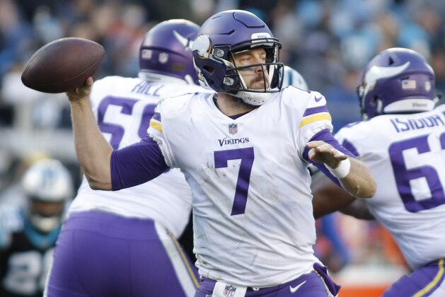 Minnesota Vikings' Case Keenum (7) looks to pass against the Carolina Panthers during the second half of an NFL football game in Charlotte, N.C., Sunday, Dec. 10, 2017. (AP Photo/Bob Leverone)