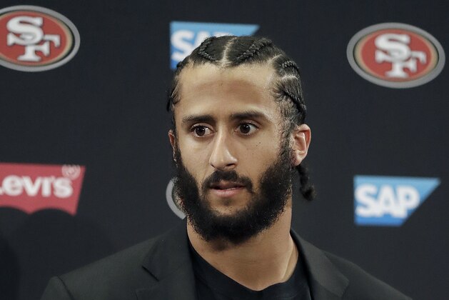 FILE - This Jan. 1, 2017, file photo shows then San Francisco 49ers quarterback Colin Kaepernick speaking at a news conference after the team's NFL football game against the Seattle Seahawks in Santa Clara, Calif. NFL spokesman Joe Lockhart says the league expects Colin Kaepernick to be invited to the next meeting between owners and players to discuss social justice initiatives. Lockhart adds that the meeting probably will take place next week. (AP Photo/Marcio Jose Sanchez, File)