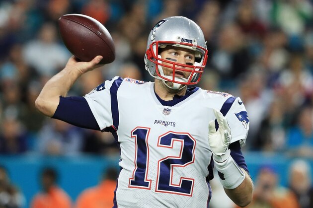 MIAMI GARDENS, FL - DECEMBER 11:  Tom Brady #12 of the New England Patriots looks to pass against the Miami Dolphins in the first quarter at Hard Rock Stadium on December 11, 2017 in Miami Gardens, Florida.  (Photo by Mike Ehrmann/Getty Images)