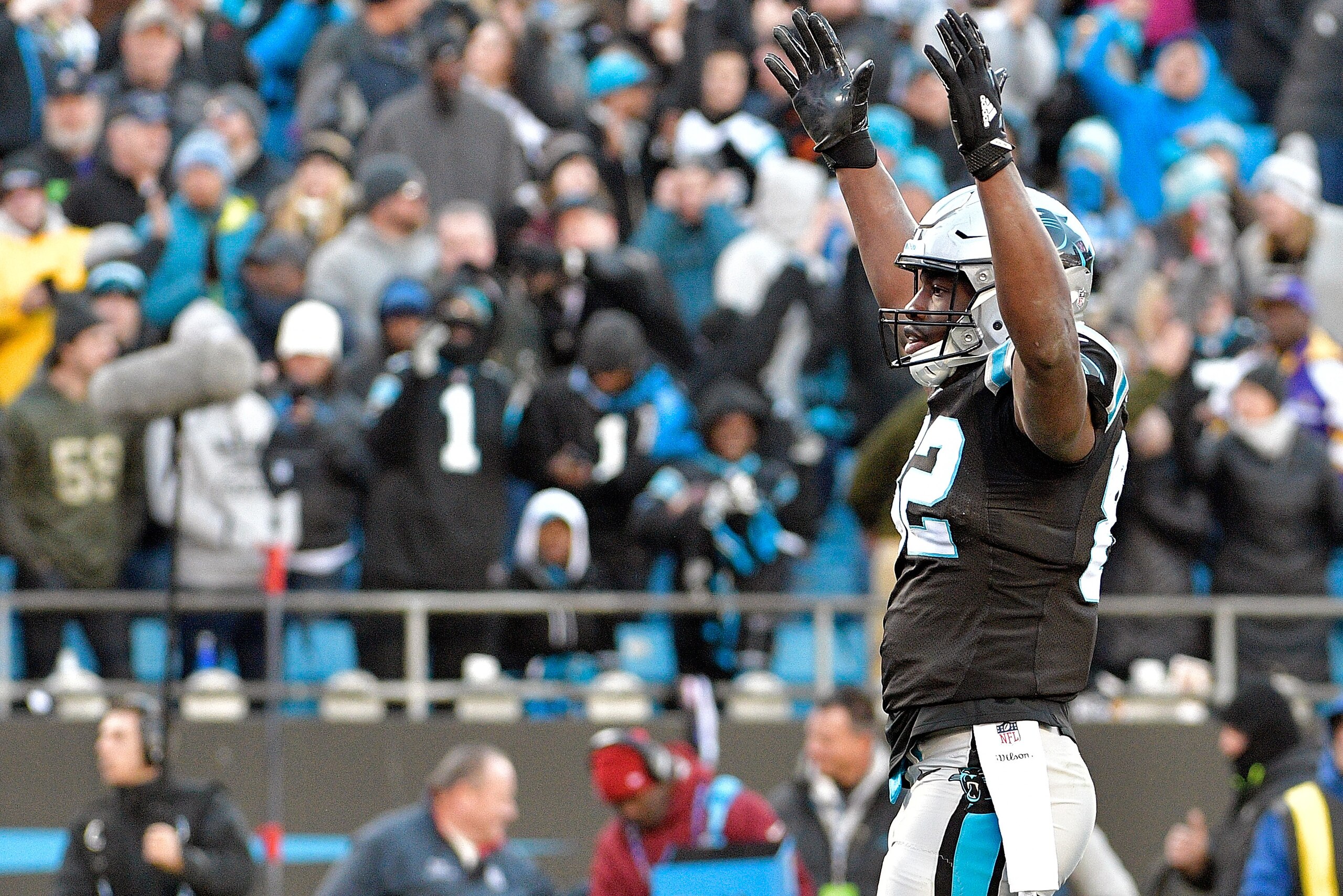 CHARLOTTE, NC - DECEMBER 10:  Chris Manhertz #82 of the Carolina Panthers celebrates after a touchdown bhy treammate Jonathan Stewart #28 during their game against the Minnesota Vikings at Bank of America Stadium on December 10, 2017 in Charlotte, North Carolina.  (Photo by Grant Halverson/Getty Images)