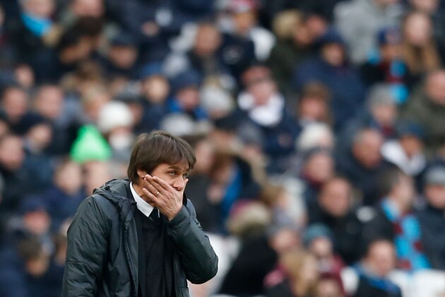 Chelsea's Italian head coach Antonio Conte gestures on the touchline during the English Premier League football match between West Ham United and Chelsea at The London Stadium, in east London on December 9, 2017. / AFP PHOTO / Ian KINGTON / RESTRICTED TO EDITORIAL USE. No use with unauthorized audio, video, data, fixture lists, club/league logos or 'live' services. Online in-match use limited to 75 images, no video emulation. No use in betting, games or single club/league/player publications.  /         (Photo credit should read IAN KINGTON/AFP/Getty Images)