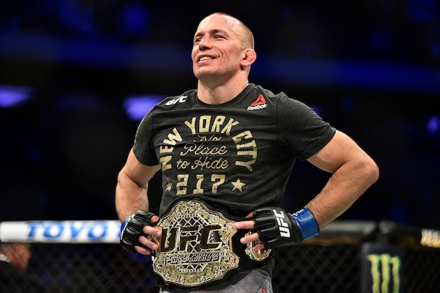 NEW YORK, NY - NOVEMBER 04:  Georges St-Pierre of Canada celebrates after defeating Michael Bisping of England in their UFC middleweight championship bout during the UFC 217 event inside Madison Square Garden on November 4, 2017 in New York City. (Photo by Jeff Bottari/Zuffa LLC/Zuffa LLC via Getty Images)