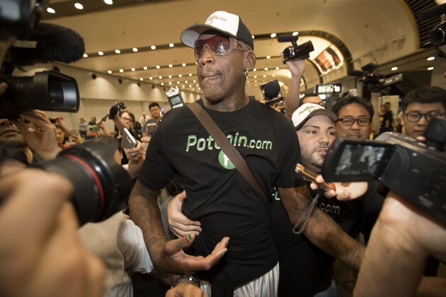 Former NBA basketball player Dennis Rodman arrives at Beijing Capital International Airport in Beijing, Saturday, June 17, 2017, after a flight from Pyongyang. Former NBA star Rodman, vowing to come back again soon, on Saturday wrapped up a low-key and incident-free visit to the North Korean capital. (AP Photo/Mark Schiefelbein)