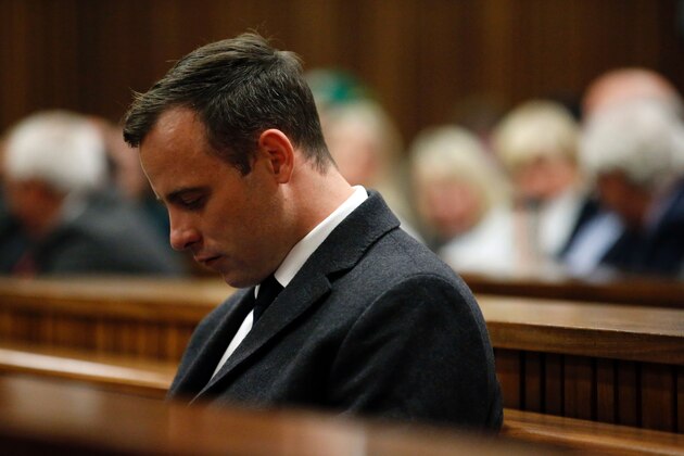 Paralympian athlete Oscar Pistorius (L), accused of the murder of his girlfriend Reeva Steenkamp three years ago, looks on during the hearing in his murder trail at the High Court in Pretoria, on July 6, 2016.
Paralympian Oscar Pistorius will learn on July 6 how long he will spend in jail when a judge sentences him for murdering his girlfriend Reeva Steenkamp three years ago. Pistorius was freed from prison in the South African capital Pretoria last October after serving one year of a five-year term for culpable homicide -- the equivalent of manslaughter.
 / AFP / POOL / MARCO LONGARI        (Photo credit should read MARCO LONGARI/AFP/Getty Images)