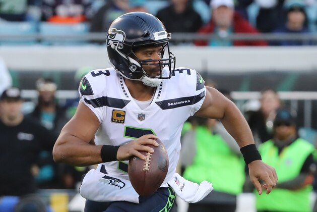 JACKSONVILLE, FL - DECEMBER 10:  Russell Wilson #3 of the Seattle Seahawks runs with the football during the first half of their game against the Jacksonville Jaguars at EverBank Field on December 10, 2017 in Jacksonville, Florida.  (Photo by Sam Greenwood/Getty Images)