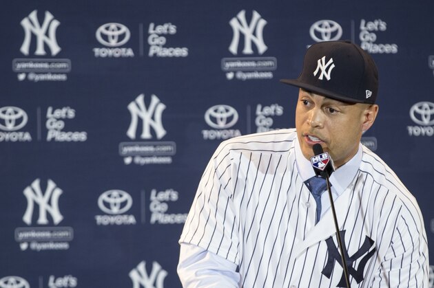 New Yankee Giancarlo Stanton answers questions during a press conference at the Major League Baseball winter meetings in Orlando, Fla., Monday, Dec. 11, 2017. (AP Photo/Willie J. Allen Jr.)