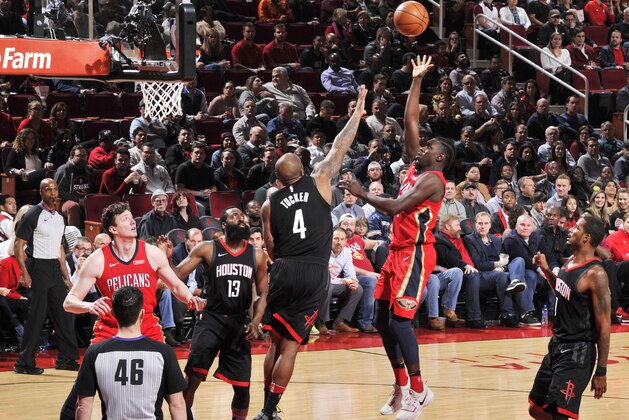 HOUSTON, TX - DECEMBER 11: Jrue Holiday #11 of the New Orleans Pelicans goes to the basket against the Houston Rockets on December 11, 2017 at the Toyota Center in Houston, Texas. NOTE TO USER: User expressly acknowledges and agrees that, by downloading and or using this photograph, User is consenting to the terms and conditions of the Getty Images License Agreement. Mandatory Copyright Notice: Copyright 2017 NBAE (Photo by Bill Baptist/NBAE via Getty Images)