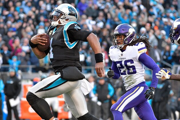 CHARLOTTE, NC - DECEMBER 10:  Cam Newton #1 of the Carolina Panthers sprints past Trae Waynes #26 of the Minnesota Vikings for a long gain to set up the game-winning touchdown during their game at Bank of America Stadium on December 10, 2017 in Charlotte, North Carolina.  (Photo by Grant Halverson/Getty Images)