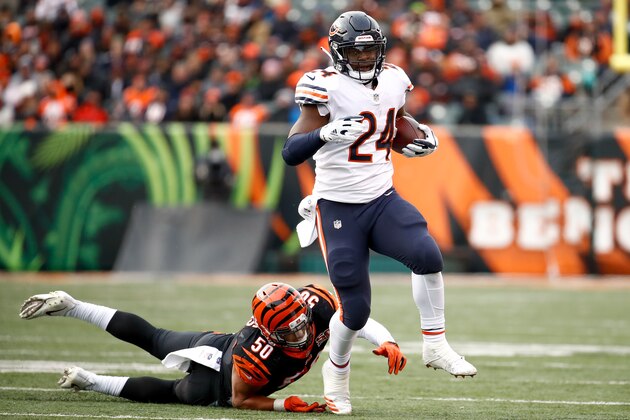 CINCINNATI, OH - DECEMBER 10:  Jordan Howard #24 of the Chicago Bears breaks a tackle from Jordan Evans #50 of the Cincinnati Bengals during the second half at Paul Brown Stadium on December 10, 2017 in Cincinnati, Ohio.  (Photo by Andy Lyons/Getty Images)