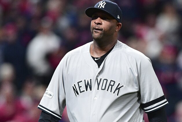 New York Yankees starting pitcher CC Sabathia walks back to the dugout in the fourth inning of Game 5 of baseball's American League Division Series against the Cleveland Indians, Wednesday, Oct. 11, 2017, in Cleveland. (AP Photo/David Dermer)