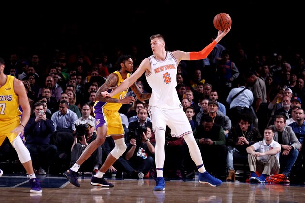 NEW YORK, NY - DECEMBER 12: Kristaps Porzingis #6 of the New York Knicks handles the ball during the game against the Los Angeles Lakers on December 12, 2017 at Madison Square Garden in New York, New York. NOTE TO USER: User expressly acknowledges and agrees that, by downloading and or using this Photograph, user is consenting to the terms and conditions of the Getty Images License Agreement. Mandatory Copyright Notice: Copyright 2017 NBAE (Photo by Nathaniel S. Butler/NBAE via Getty Images)
