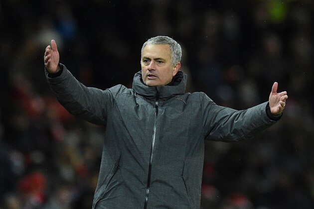 Manchester United's Portuguese manager Jose Mourinho gestures on the thouchline during the English Premier League football match between Manchester United and Manchester City at Old Trafford in Manchester, north west England, on December 10, 2017. / AFP PHOTO / Oli SCARFF / RESTRICTED TO EDITORIAL USE. No use with unauthorized audio, video, data, fixture lists, club/league logos or 'live' services. Online in-match use limited to 75 images, no video emulation. No use in betting, games or single club/league/player publications.  /         (Photo credit should read OLI SCARFF/AFP/Getty Images)