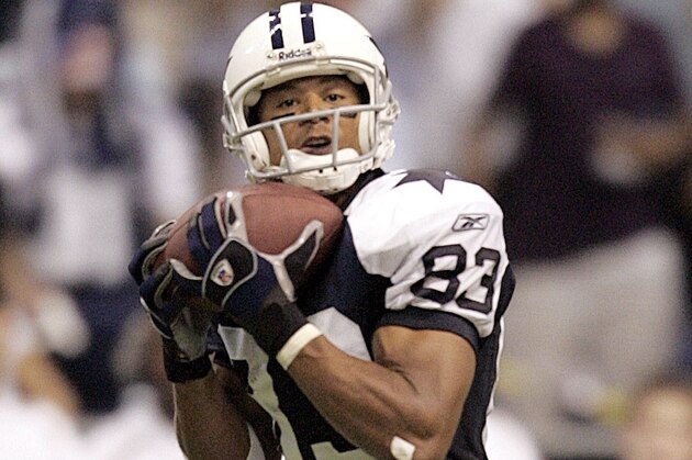 Dallas Cowboys wide receiver Terry Glenn pulls in a touchdown pass against the Washington Redskins in the third quarter in Irving, Texas, Monday, Sept. 19, 2005. (AP Photo/L.M. Otero)