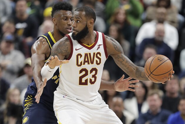 Cleveland Cavaliers' LeBron James is defended by Indiana Pacers' Thaddeus Young during the second half of an NBA basketball game, Friday, Dec. 8, 2017, in Indianapolis. The Pacers won 106-102. (AP Photo/Darron Cummings)