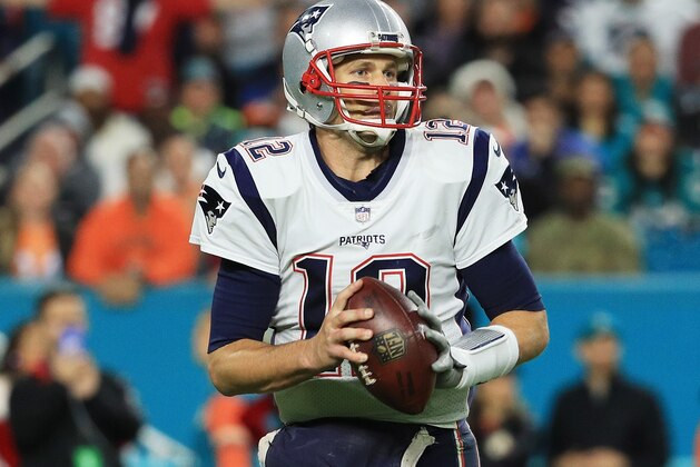 MIAMI GARDENS, FL - DECEMBER 11:  Tom Brady #12 of the New England Patriots looks to pass in the fourth quarter against the Miami Dolphins at Hard Rock Stadium on December 11, 2017 in Miami Gardens, Florida.  (Photo by Mike Ehrmann/Getty Images)