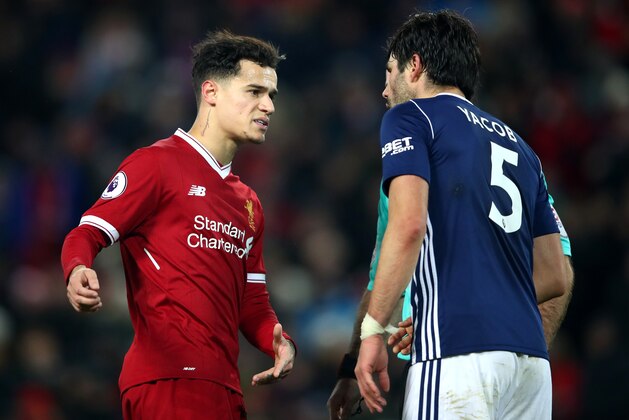 LIVERPOOL, ENGLAND - DECEMBER 13: Philippe Coutinho of Liverpool argues with Claudio Yacob of West Bromwich Albion during the Premier League match between Liverpool and West Bromwich Albion at Anfield on December 13, 2017 in Liverpool, England.  (Photo by Clive Brunskill/Getty Images)