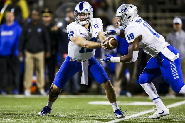 BOWLING GREEN, KY - NOVEMBER 17: Quarterback Brent Stockstill #12 of the Middle Tennessee Blue Raiders hands the ball to Running back  Tavares Thomas #18 of the Middle Tennessee Blue Raiders in a game against Western Kentucky at L.T. Smith Stadium on November 17, 2017 in Bowling Green, Kentucky. (Photo by Shaban Athuman/Getty Images)