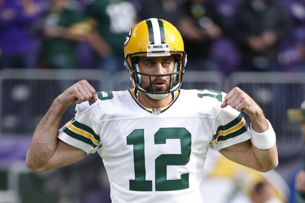 Green Bay Packers quarterback Aaron Rodgers (12) warms up before an NFL football game against the Minnesota Vikings in Minneapolis, Sunday, Oct. 15, 2017. (AP Photo/Bruce Kluckhohn)