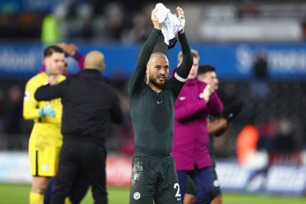 SWANSEA, WALES - DECEMBER 13: David Silva of Manchester City shows appreciation to the fans after  the Premier League match between Swansea City and Manchester City at Liberty Stadium on December 13, 2017 in Swansea, Wales.  (Photo by Michael Steele/Getty Images)