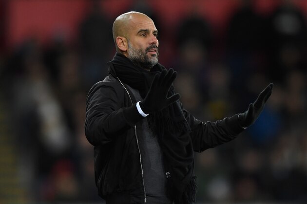 SWANSEA, WALES - DECEMBER 13:  Manchester City manager Pep Guardiola reacts on the touchline during the Premier League match between Swansea City and Manchester City at Liberty Stadium on December 13, 2017 in Swansea, Wales.  (Photo by Stu Forster/Getty Images)