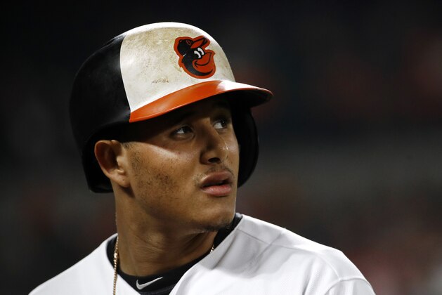 Baltimore Orioles' Manny Machado walks off the field after flying out during a baseball game against the New York Yankees in Baltimore, Tuesday, Sept. 5, 2017. (AP Photo/Patrick Semansky)