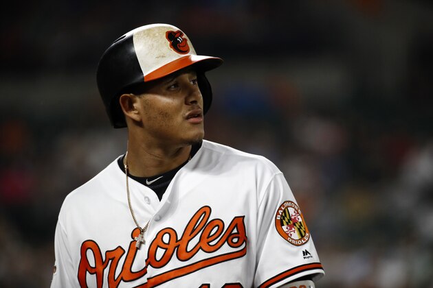 Baltimore Orioles' Manny Machado walks off the field after flying out during a baseball game against the New York Yankees in Baltimore, Tuesday, Sept. 5, 2017. (AP Photo/Patrick Semansky)