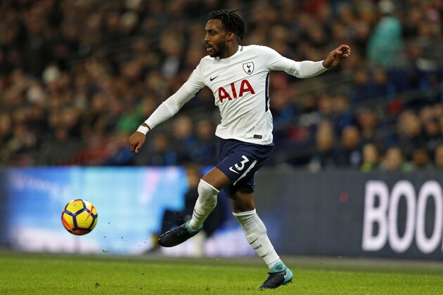 Tottenham Hotspur's English defender Danny Rose passes the ball during the English Premier League football match between Tottenham Hotspur and Brighton and Hove Albion at Wembley Stadium in London, on December 13, 2017. / AFP PHOTO / Adrian DENNIS / RESTRICTED TO EDITORIAL USE. No use with unauthorized audio, video, data, fixture lists, club/league logos or 'live' services. Online in-match use limited to 75 images, no video emulation. No use in betting, games or single club/league/player publications.  /         (Photo credit should read ADRIAN DENNIS/AFP/Getty Images)