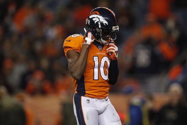 Denver Broncos wide receiver Emmanuel Sanders (10) adjusts his helmet during the second half of an NFL football game against the New England Patriots, Sunday, Nov. 12, 2017, in Denver. The Patriots won 41-16. (AP Photo/David Zalubowski)