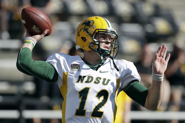 North Dakota State quarterback Easton Stick warms up before an NCAA college football game against Iowa, Saturday, Sept. 17, 2016, in Iowa City, Iowa. (AP Photo/Charlie Neibergall)