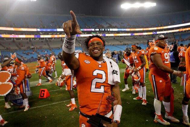CHARLOTTE, NC - DECEMBER 02:  Kelly Bryant #2 of the Clemson Tigers celebrates with the MVP trophy after defeating the Miami Hurricanes 38-3 in the ACC Football Championship at Bank of America Stadium on December 2, 2017 in Charlotte, North Carolina.  (Photo by Streeter Lecka/Getty Images)