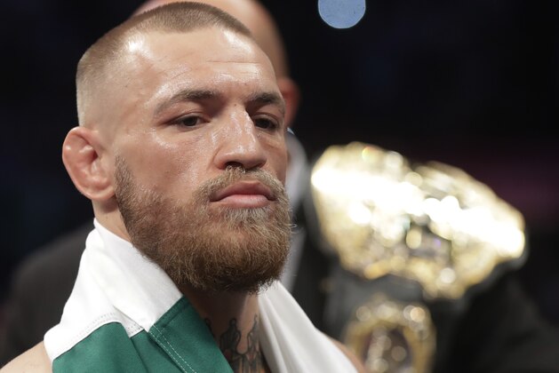 Conor McGregor enters the ring before a super welterweight boxing match against Floyd Mayweather Jr., Saturday, Aug. 26, 2017, in Las Vegas. (AP Photo/Isaac Brekken)
