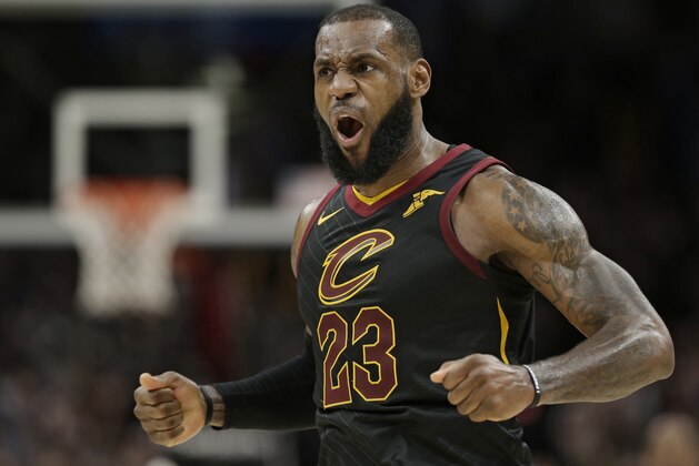 Cleveland Cavaliers' LeBron James celebrates after scoring in the second half of an NBA basketball game against the Sacramento Kings, Wednesday, Dec. 6, 2017, in Cleveland. The Cavaliers won 101-95. (AP Photo/Tony Dejak)