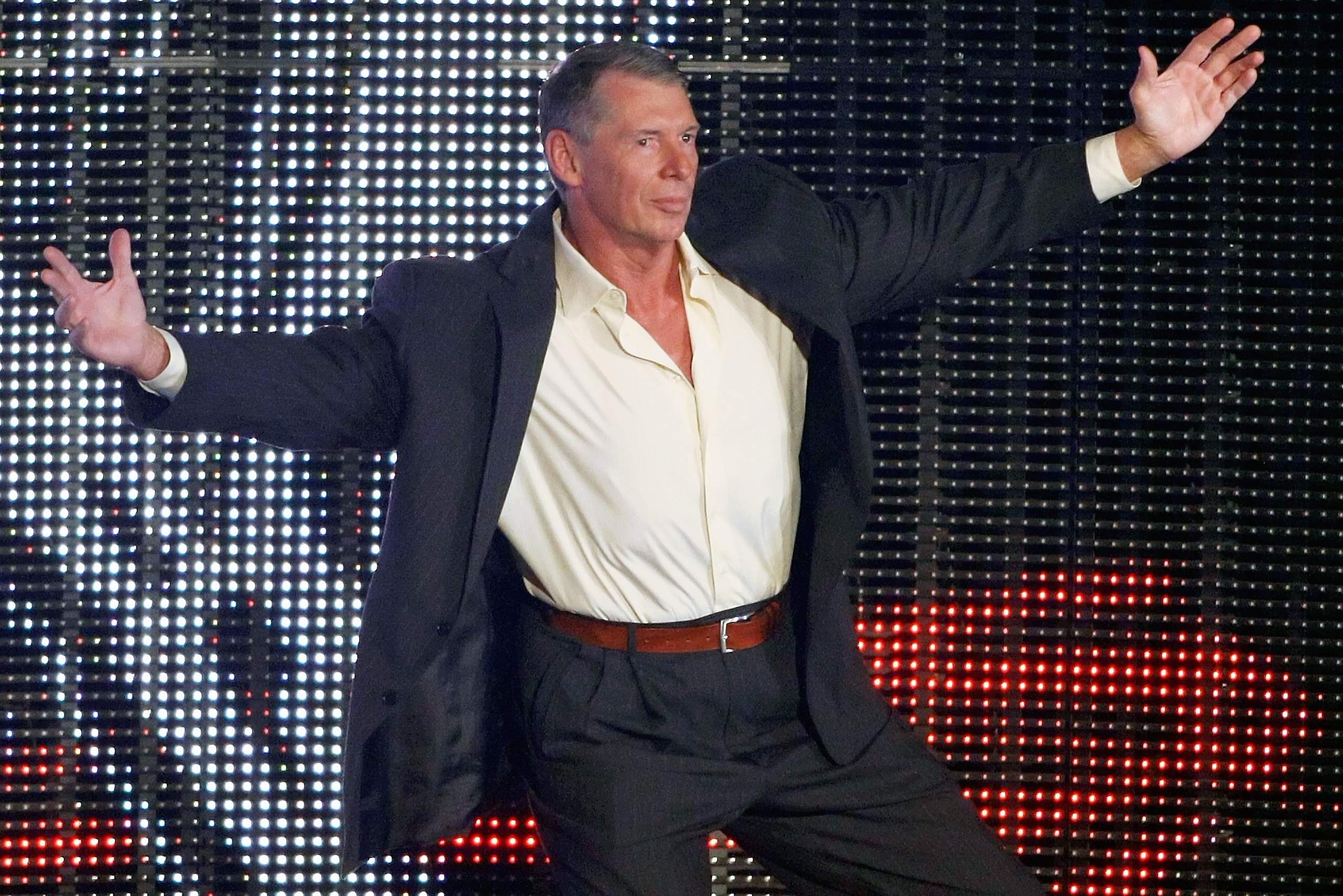 LAS VEGAS - AUGUST 24: World Wrestling Entertainment Inc. Chairman Vince McMahon is introduced during the WWE Monday Night Raw show at the Thomas & Mack Center August 24, 2009 in Las Vegas, Nevada. (Photo by Ethan Miller/Getty Images) LAS VEGAS - AUGUST 24: World Wrestling Entertainment Inc. Chairman Vince McMahon is introduced during the WWE Monday Night Raw show at the Thomas & Mack Center August 24, 2009 in Las Vegas, Nevada. (Photo by Ethan Miller/Getty Images)