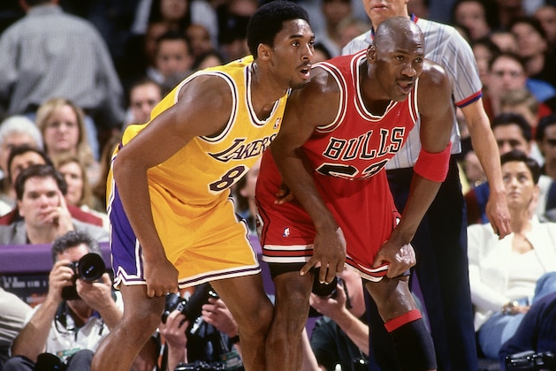 INGLEWOOD, CA - FEBRUARY 1: Kobe Bryant #8 of the Los Angeles Lakers defends against Michael Jordan #23 of the Chicago Bulls on February 1, 1998 at The Forum in Inglewood, California. NOTE TO USER: User expressly acknowledges and agrees that, by downloading and/or using this Photograph, user is consenting to the terms and conditions of the Getty Images License Agreement. Mandatory Copyright Notice: Copyright 1998 NBAE (Photo by Andrew D. Bernstein/NBAE via Getty Images)