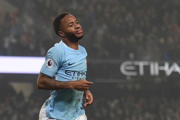 Manchester City's English midfielder Raheem Sterling celebrates after scoring their third goal during the English Premier League football match between Manchester City and Tottenham Hotspur at the Etihad Stadium in Manchester, north west England, on December 16, 2017. / AFP PHOTO / PAUL ELLIS / RESTRICTED TO EDITORIAL USE. No use with unauthorized audio, video, data, fixture lists, club/league logos or 'live' services. Online in-match use limited to 75 images, no video emulation. No use in betting, games or single club/league/player publications.  /         (Photo credit should read PAUL ELLIS/AFP/Getty Images)
