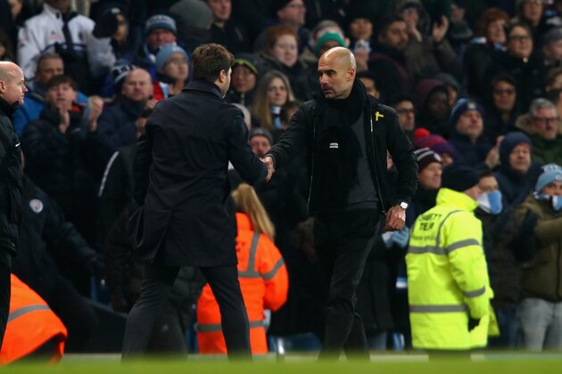 MANCHESTER, ENGLAND - DECEMBER 16:  Mauricio Pochettino, Manager of Tottenham Hotspur and Josep Guardiola, Manager of Manchester City shake hands after the Premier League match between Manchester City and Tottenham Hotspur at Etihad Stadium on December 16, 2017 in Manchester, England.  (Photo by Clive Brunskill/Getty Images)