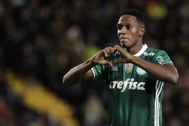 Yerry Mina of Brazil's Palmeiras celebrates after scoring against Uruguay's Penarol during a Copa Libertadores soccer match in Montevideo, Uruguay, Wednesday, April 26, 2017. (AP Photo/Matilde Campodonico)