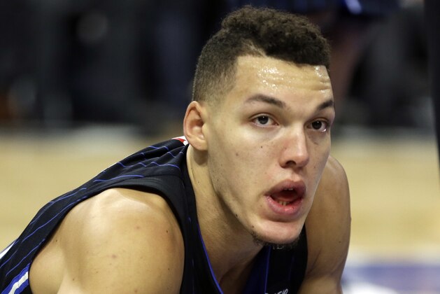 Orlando Magic's Aaron Gordon gets up from the floor after he was injured during the second half of an NBA basketball game against the Denver Nuggets, Friday, Dec. 8, 2017, in Orlando, Fla. Gordon left the game a short time later with a concussion. (AP Photo/John Raoux) Orlando Magic's Aaron Gordon gets up from the floor after he was injured during the second half of an NBA basketball game against the Denver Nuggets, Friday, Dec. 8, 2017, in Orlando, Fla. Gordon left the game a short time later with a concussion. (AP Photo/John Raoux)