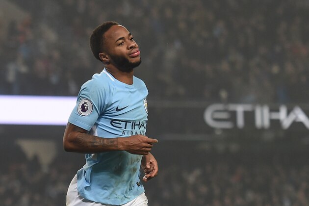Manchester City's English midfielder Raheem Sterling celebrates after scoring their third goal during the English Premier League football match between Manchester City and Tottenham Hotspur at the Etihad Stadium in Manchester, north west England, on December 16, 2017. / AFP PHOTO / PAUL ELLIS / RESTRICTED TO EDITORIAL USE. No use with unauthorized audio, video, data, fixture lists, club/league logos or 'live' services. Online in-match use limited to 75 images, no video emulation. No use in betting, games or single club/league/player publications.  /         (Photo credit should read PAUL ELLIS/AFP/Getty Images)