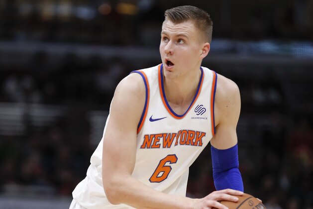 New York Knicks forward Kristaps Porzingis looks to shoot against the Chicago Bulls during the first half of an NBA basketball game, Saturday, Dec. 9, 2017, in Chicago. (AP Photo/Kamil Krzaczynski)