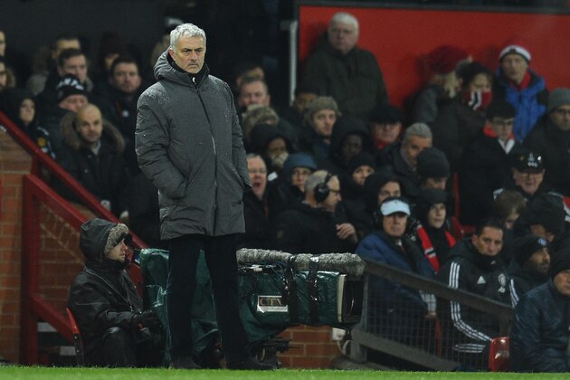 Manchester United's Portuguese manager Jose Mourinho looks on during the English Premier League football match between Manchester United and Bournemouth at Old Trafford in Manchester, north west England, on December 13, 2017. / AFP PHOTO / Oli SCARFF / RESTRICTED TO EDITORIAL USE. No use with unauthorized audio, video, data, fixture lists, club/league logos or 'live' services. Online in-match use limited to 75 images, no video emulation. No use in betting, games or single club/league/player publications.  /         (Photo credit should read OLI SCARFF/AFP/Getty Images)