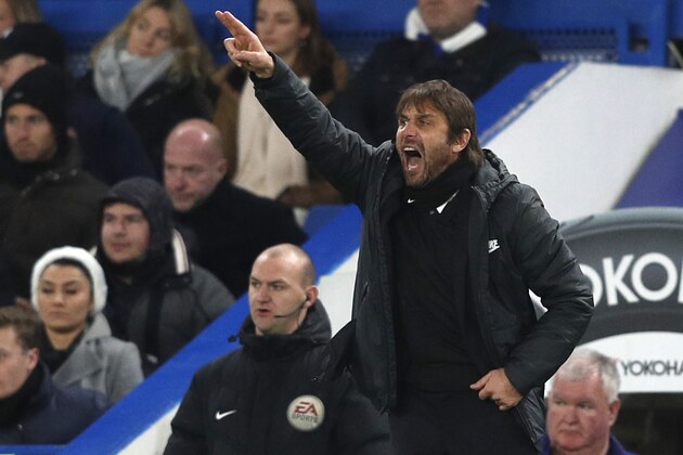Chelsea's Italian head coach Antonio Conte gestures during the English Premier League football match between Chelsea and Southampton at Stamford Bridge in London on December 16, 2017. / AFP PHOTO / Adrian DENNIS / RESTRICTED TO EDITORIAL USE. No use with unauthorized audio, video, data, fixture lists, club/league logos or 'live' services. Online in-match use limited to 75 images, no video emulation. No use in betting, games or single club/league/player publications.  /         (Photo credit should read ADRIAN DENNIS/AFP/Getty Images)