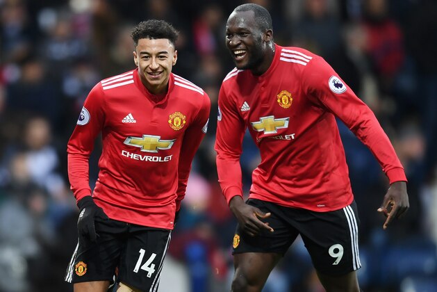 WEST BROMWICH, ENGLAND - DECEMBER 17:  Jesse Lingard of Manchester United celebrates with teammate Romelu Lukaku after scoring his sides second goal during the Premier League match between West Bromwich Albion and Manchester United at The Hawthorns on December 17, 2017 in West Bromwich, England.  (Photo by Michael Regan/Getty Images)