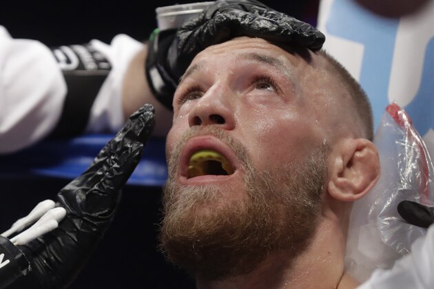 Conor McGregor in his corner against Floyd Mayweather Jr. in a super welterweight boxing match Saturday, Aug. 26, 2017, in Las Vegas. (AP Photo/Isaac Brekken)