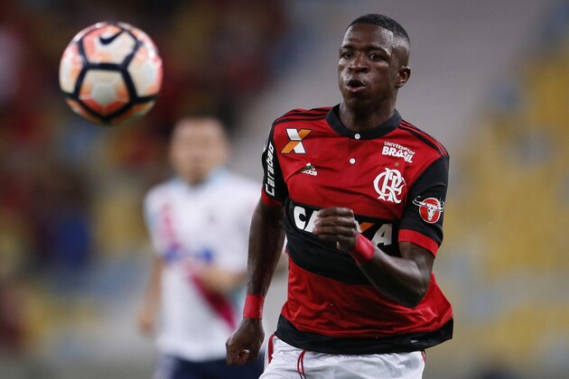 Vinicius Junior of Brazil's Flamengo goes for the ball during a Copa Sudamericana soccer match against Colombia's Junior at Maracana stadium, in Rio de Janeiro, Brazil, Thursday, Nov. 23, 2017. (AP Photo/Bruna Prado)