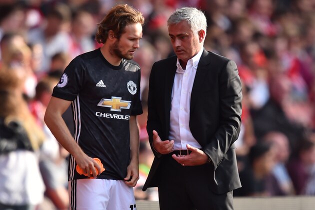 Manchester United's Portuguese manager Jose Mourinho (R) speaks with Manchester United's Dutch midfielder Daley Blind on the touchline during the English Premier League football match between Southampton and Manchester United at St Mary's Stadium in Southampton, southern England on September 23, 2017. / AFP PHOTO / Glyn KIRK / RESTRICTED TO EDITORIAL USE. No use with unauthorized audio, video, data, fixture lists, club/league logos or 'live' services. Online in-match use limited to 75 images, no video emulation. No use in betting, games or single club/league/player publications.  /         (Photo credit should read GLYN KIRK/AFP/Getty Images)