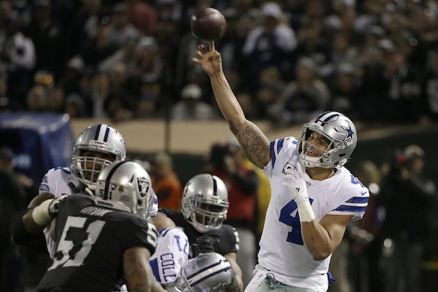 Dallas Cowboys quarterback Dak Prescott (4) passes against the Oakland Raiders during the second half of an NFL football game in Oakland, Calif., Sunday, Dec. 17, 2017. (AP Photo/Eric Risberg)