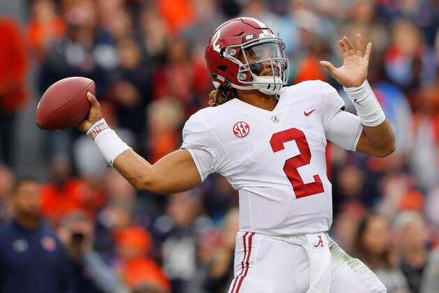 AUBURN, AL - NOVEMBER 25:  Jalen Hurts #2 of the Alabama Crimson Tide throws a pass during the first quarter against the Auburn Tigers at Jordan Hare Stadium on November 25, 2017 in Auburn, Alabama.  (Photo by Kevin C. Cox/Getty Images)