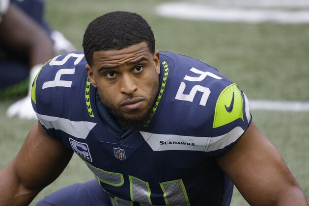 Seattle Seahawks middle linebacker Bobby Wagner stretches before an NFL football game against the Los Angeles Rams, Sunday, Dec. 17, 2017, in Seattle. (AP Photo/Elaine Thompson)