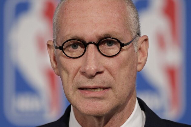 ESPN President John Skipper talks at a news conference after a deal was announced between the NBA and TV networks, Monday, Oct. 6, 2014 in New York. The NBA has extended its television deals with ESPN and TNT for nine years. The league announced Monday that the new contracts will run through the 2024-25 season. The previous eight-year agreements end after the 2015-16 season. (AP Photo/Mark Lennihan)